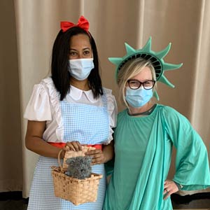Photo of two women as the Statue of Liberty and Dorothy from the Wizard of Oz for Halloween