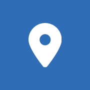 White map pin icon over blue background
