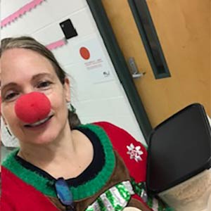 Photo of Nicole S with a red Rudolph nose